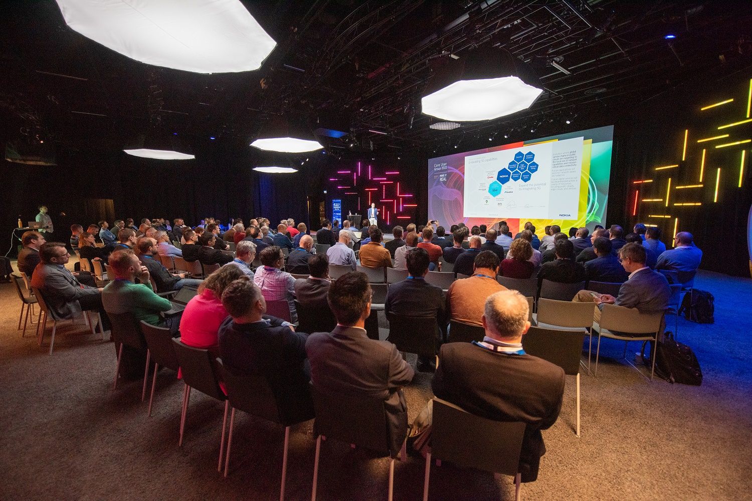 Lauri Alho presents a keynote on Network as Code and embedding 5G capabilities to customers at the Nokia Core User Group 2022 event.