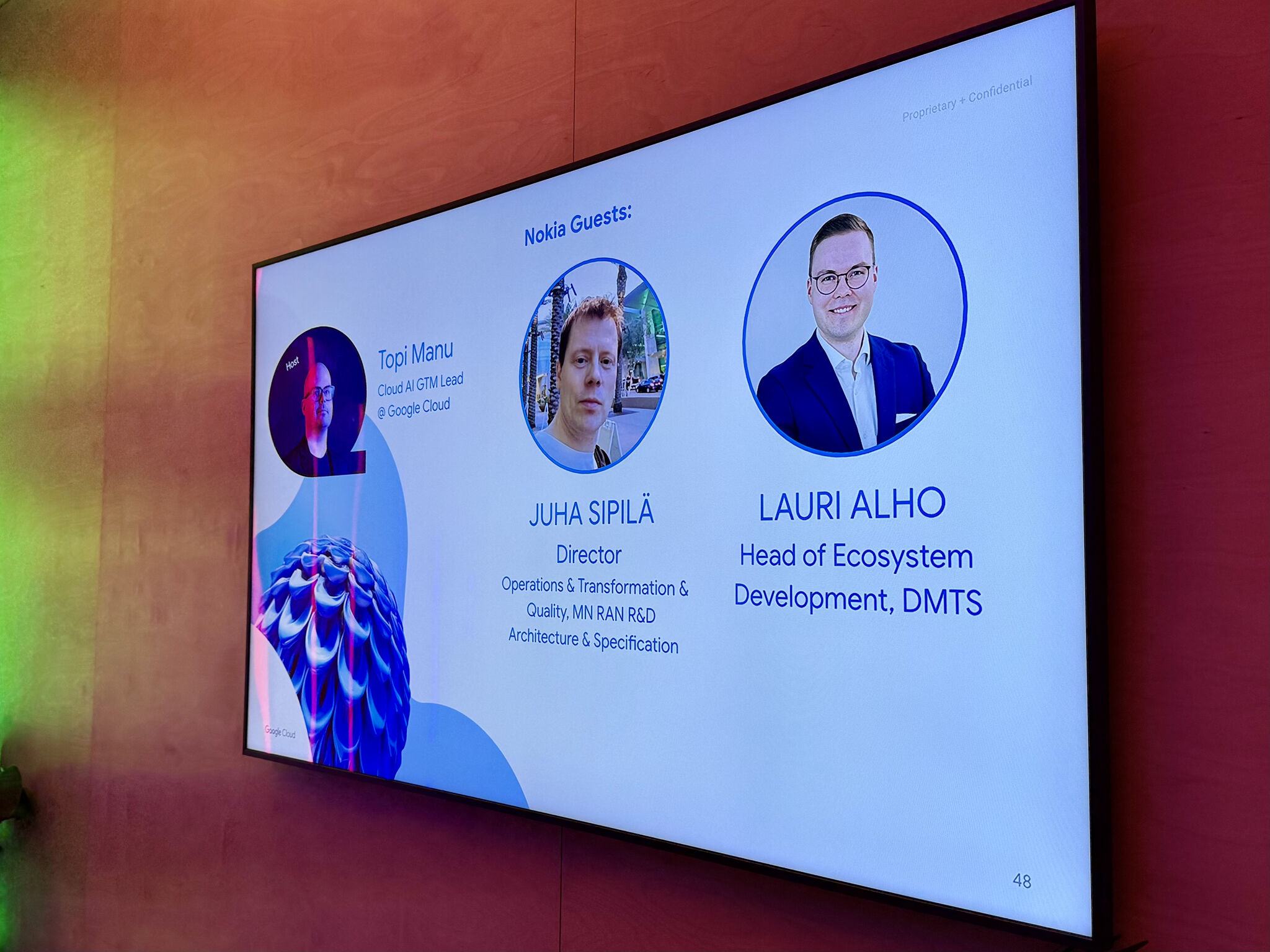 Presentation slide introducing Topi Manu of Google, Juha Sipilä of Nokia, and Lauri Alho of Nokia, who participated in a Fireside Chat at Slush discussing AI and its telco use cases.