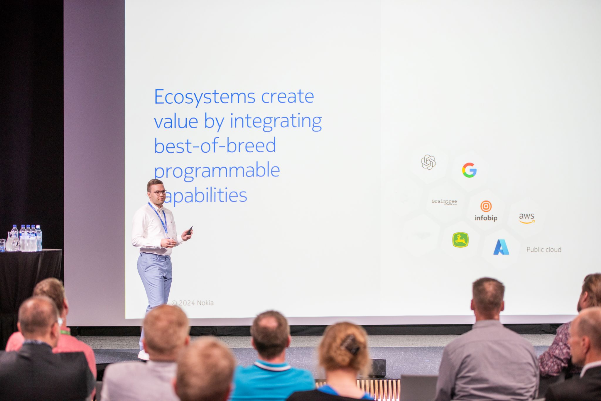 Lauri Alho presents on monetizing programmable networks with Nokia Network as Code, illustrating how ecosystems integrate best-of-breed programmable capabilities from entities like OpenAI, Google, AWS, Azure, and Infobip at the Telia MWC24 Revisited event at Nokia HQs.