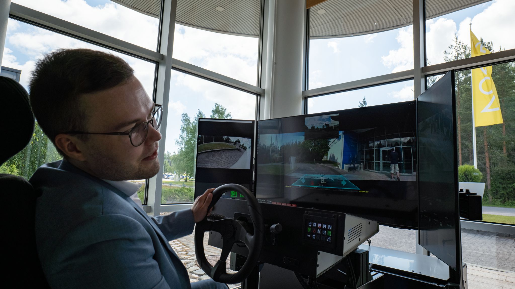 Lauri Alho demonstrates Nokia Network as Code by teledriving an Elmo car over the Elisa 5G network at Nokia Core User Group 2024, showcasing the Quality on Demand capability for improved video.