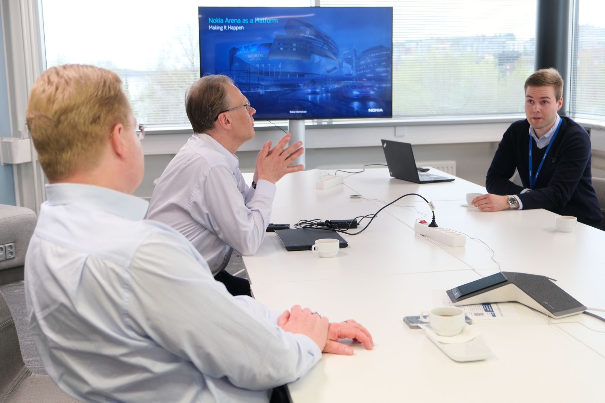 Lauri Alho presents plans for Nokia Arena as a Platform for innovation to Nokia President of Mobile Networks, Tommi Uitto and Tampere Site Head, Petri Ahokas.