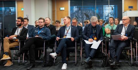 Lauri Alho with other jury members and attendees at the Orange Camara API Hackathon in Warsaw, Poland, focused on Network as Code and Camara APIs, a collaboration between Orange and Nokia.