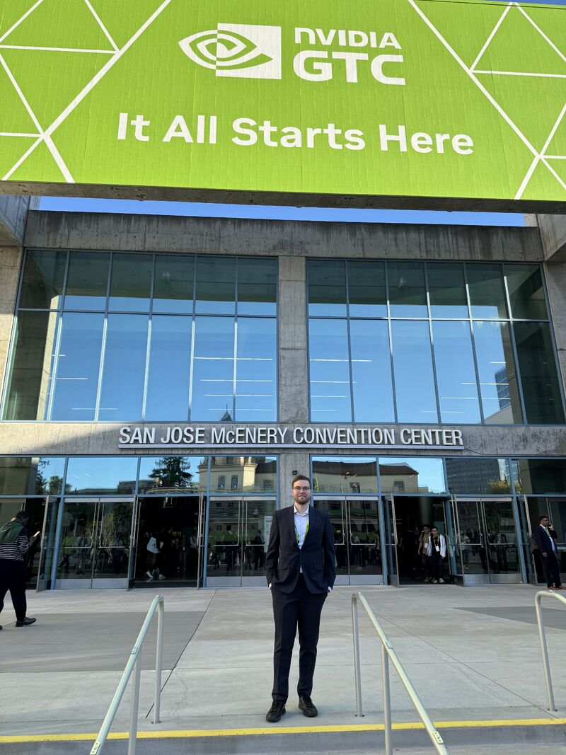 Lauri Alho standing in front of the NVIDIA GTC San Jose event sign at the San Jose McEnery Convention Center, the location for the collaboration announcement between NVIDIA, T-Mobile, and Nokia on AI-RAN infrastructure for distributed edge AI computing.